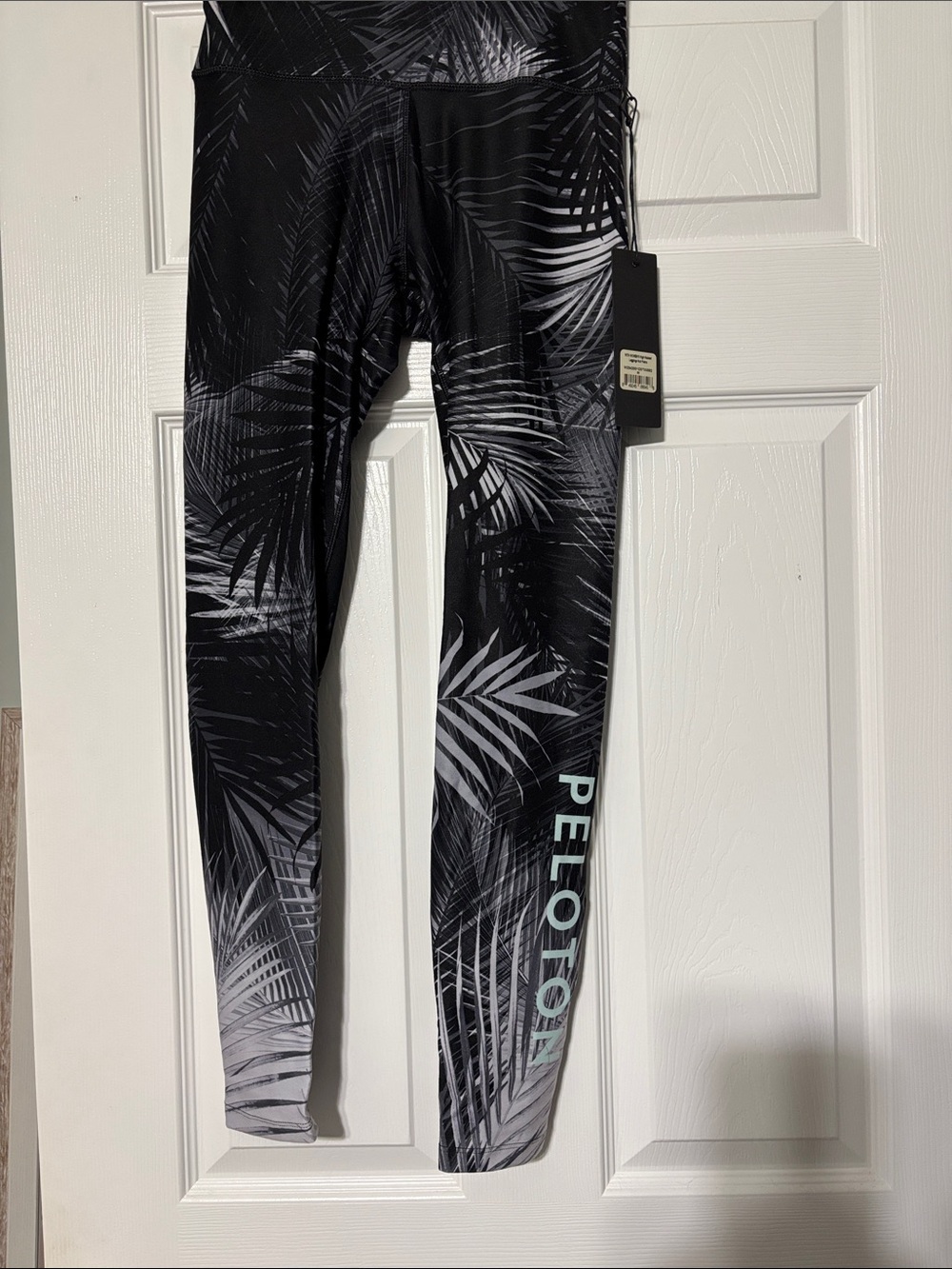 Peloton Black & White WITH Palm-Print Leggings with Teal Logo